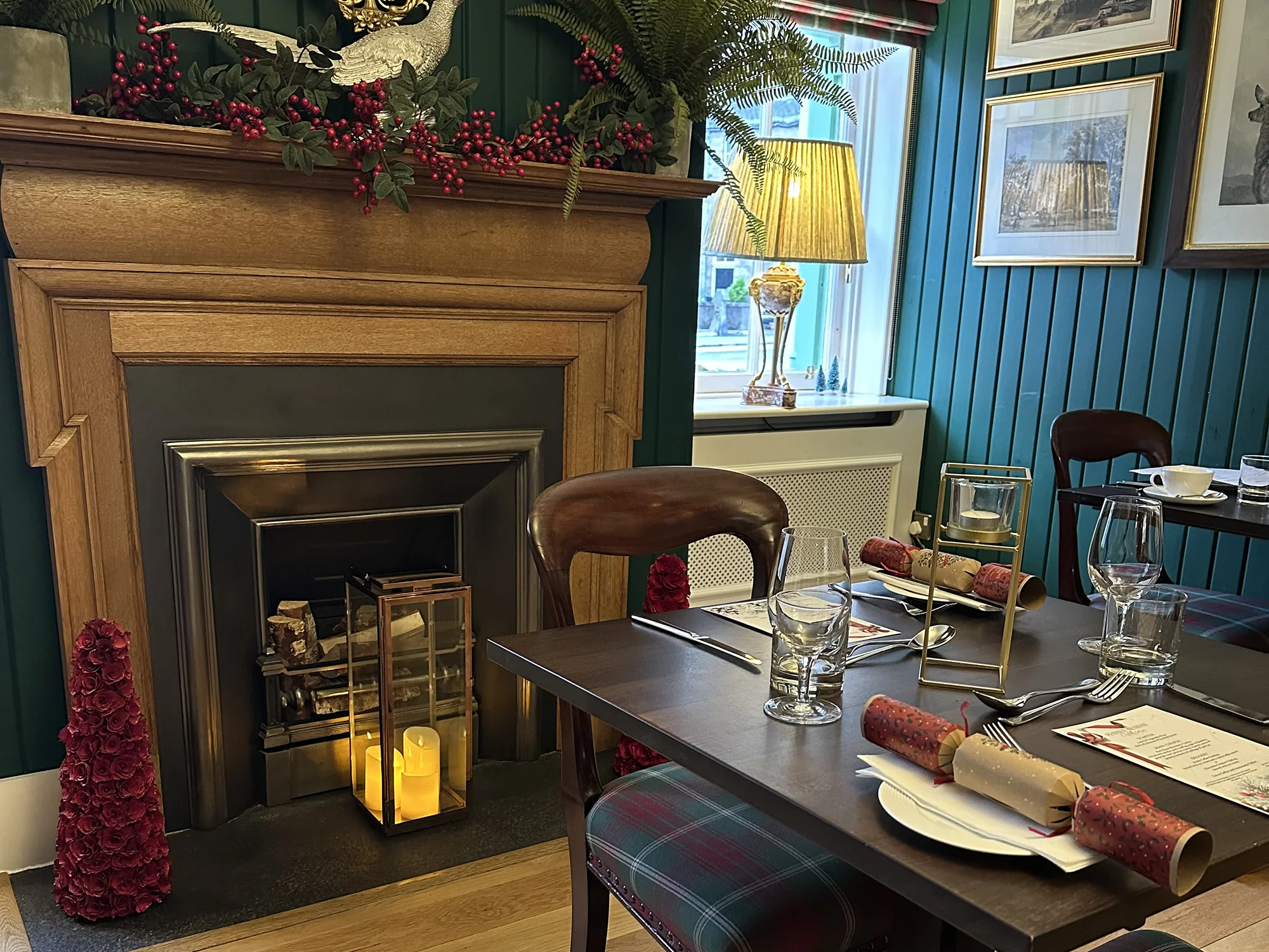 Table with crackers by a fireplace.